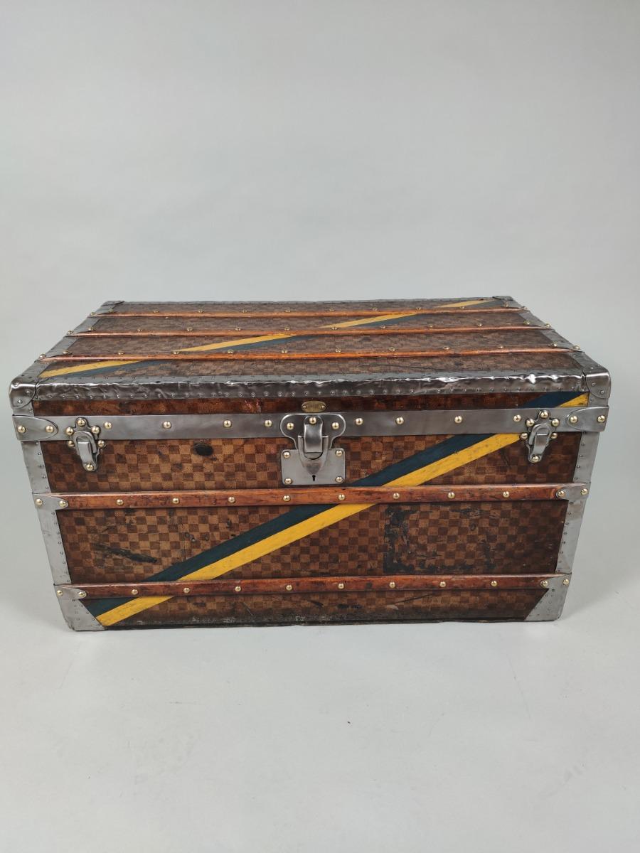 This magnificent striped steamer trunk from the Louis Vuitton